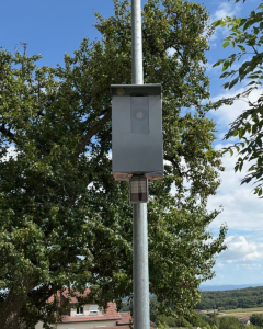 City surveillance light on a post in France